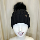 Cappello nero GIO HIGUAMY misto lana a coste con pompon in volpe ecologica