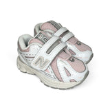 Sneakers ginniche NEWBALANCE 1906 bianca e rosa con strap