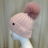 Cappello rosa GIO HIGUAMY misto lana a coste con pompon in volpe ecologica