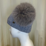 Cappello grigio GIO HIGUAMY misto lana con doppio pompon in volpe ecologica