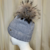 Cappello grigio GIO HIGUAMY misto lana con  pompon in mourmansky